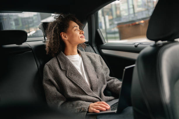 Happy passenger in luxury car